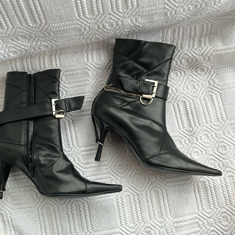Black super pointy leather ankle boots